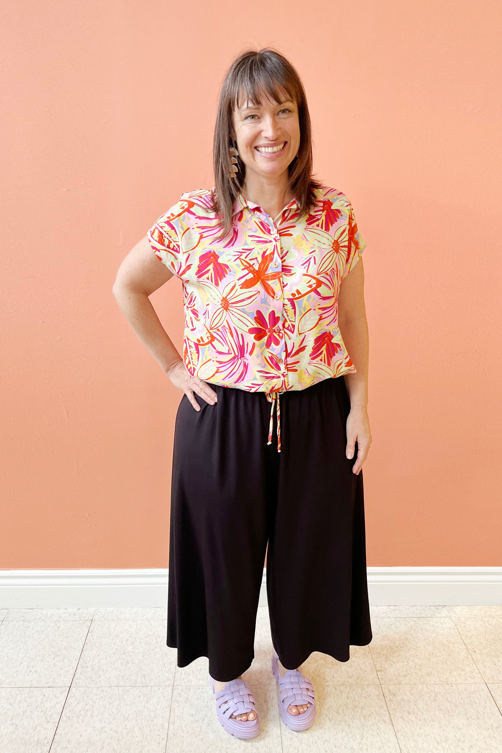 Camila Shirt by Pure Essence, Pink Floral, classic collar and button front, short sleeves, drawstring at the waist, loose fit, sizes XS to XXL, made in Canada