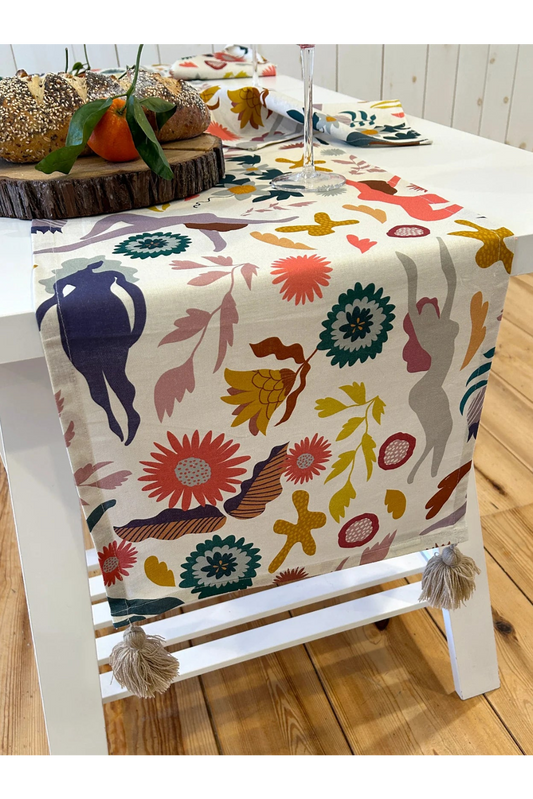Stories Table Runner with Pompoms