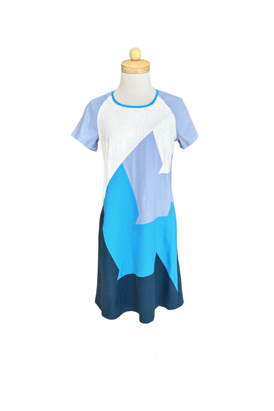 The Victoria Dress by Solomia is shown on a mannequin against a white background. 
