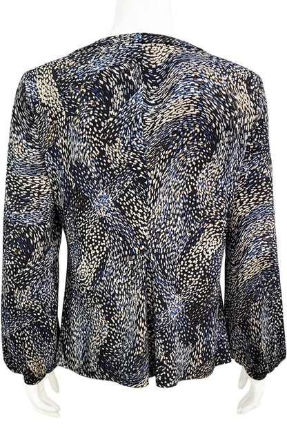 A back view of the Gwen Blouse by Mandala in Starry Night - Blue print is shown on a mannequin against a white background.