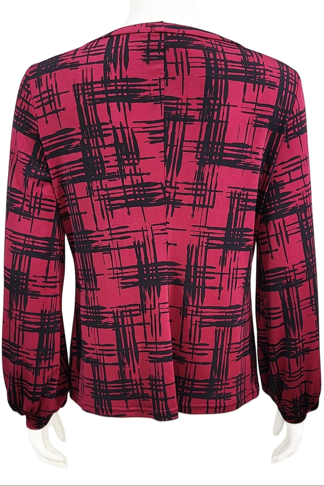 A back view of the Gwen Blouse by Mandala in Hopscotch - Cherry print is shown on a mannequin against a white background.