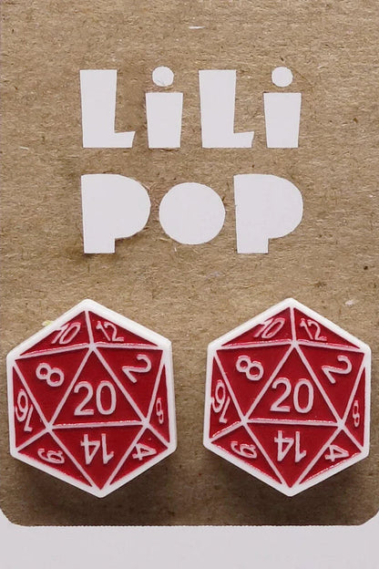 Red and white DND dice-shaped earrings on a brown card with 'Lili Pop' branding.